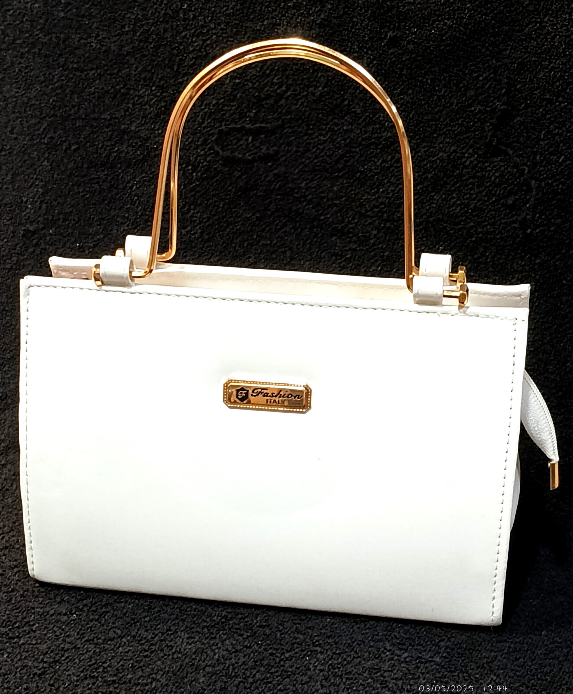 Bag white with golden handle 